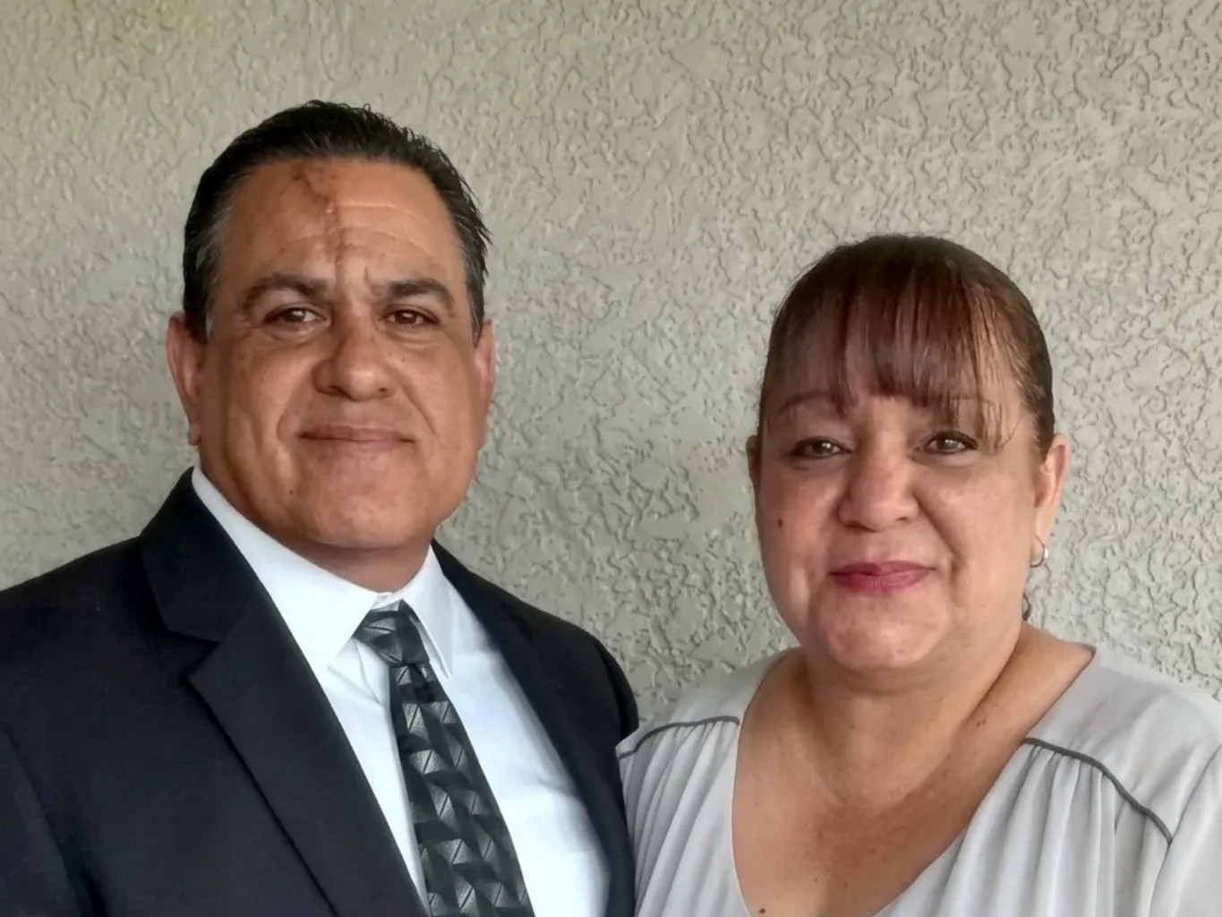 Rafael Gonzalez, owner of Gold Star Garage Doors, with his wife